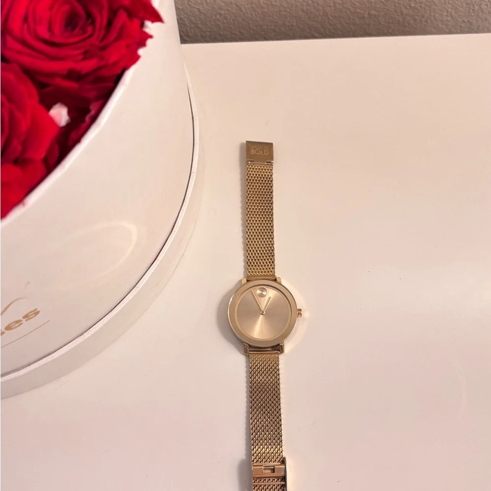 Movado Gold Mesh Women's Watch
Used in fair condition. Needs a new battery. - Picture 5 of 7